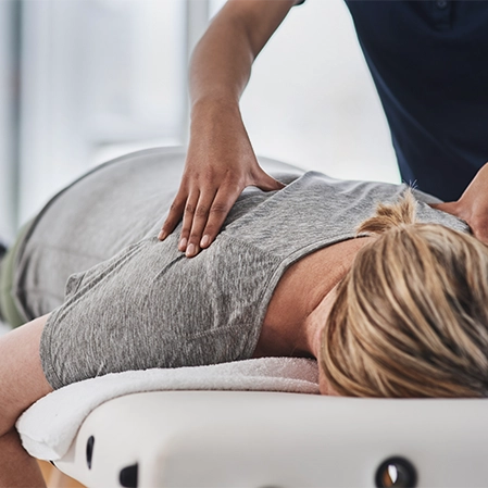 Chiropractic Johnson City TN Woman Receiving Adjustment